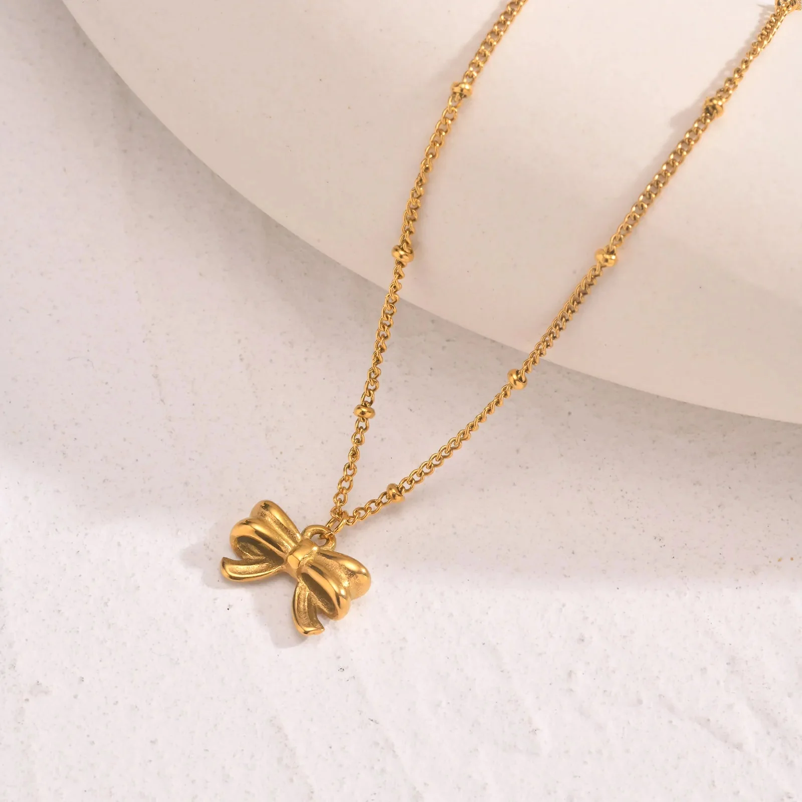 14k Dainty Feminine Bow Necklace - Image 5