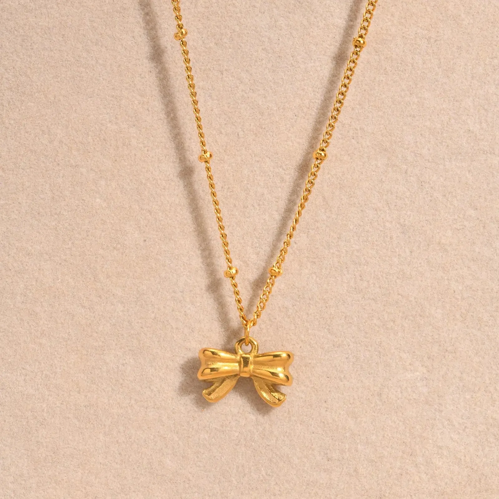14k Dainty Feminine Bow Necklace - Image 7