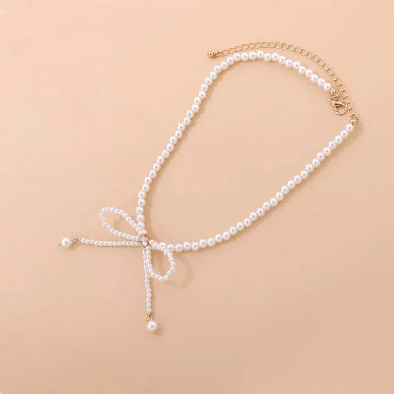 Dainty Beaded Pearl Bow Choker Necklace - Image 6