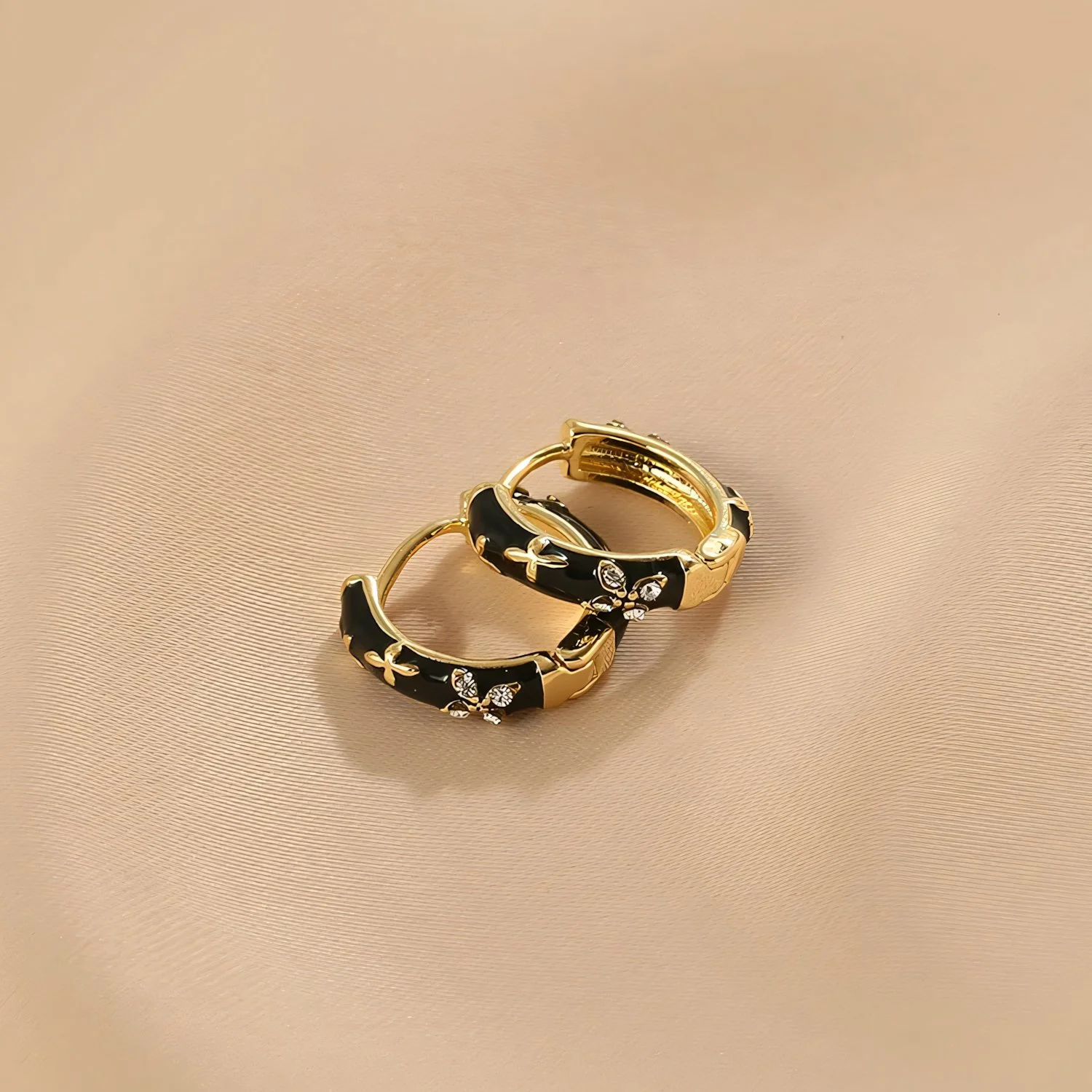 Dainty Black and Gold Floral Hoop Earrings - Image 9