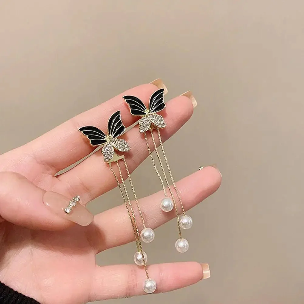 Dainty Butterfly Dangle Earrings - Image 10