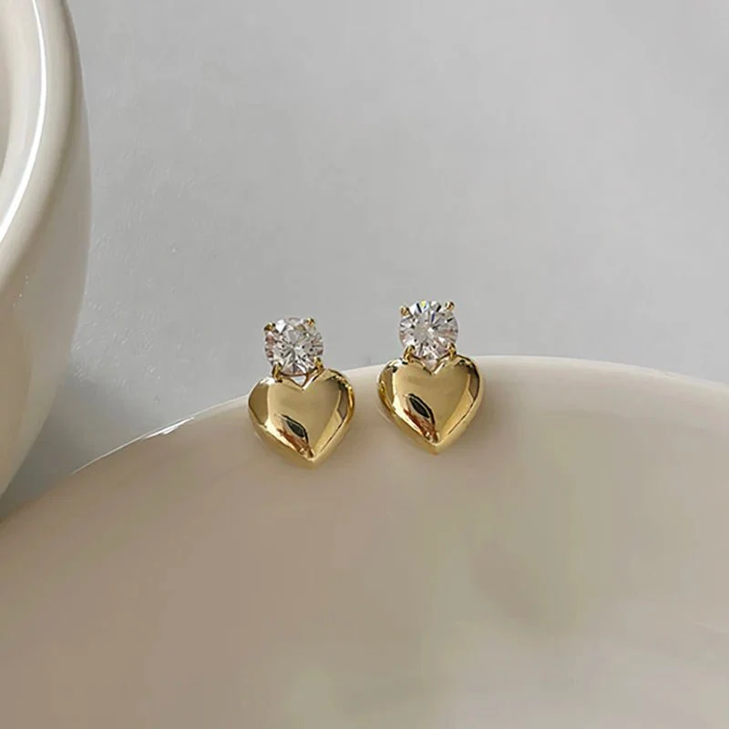 Dainty Diamond Heart Stud Earrings - Image 7
