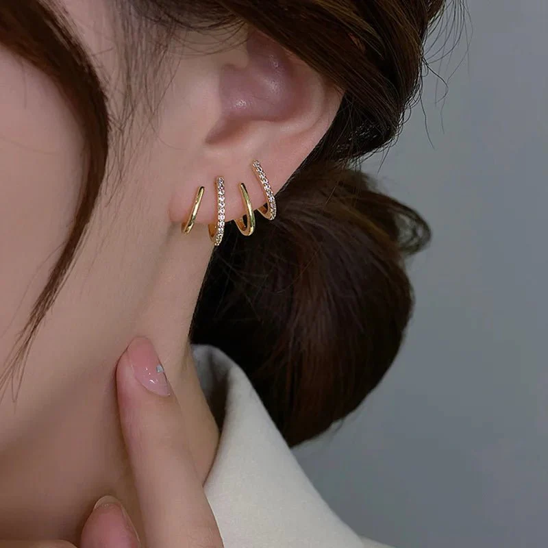 Dainty Shimmering Claw Huggie Earrings - Image 4