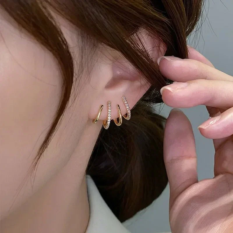 Dainty Shimmering Claw Huggie Earrings - Image 5