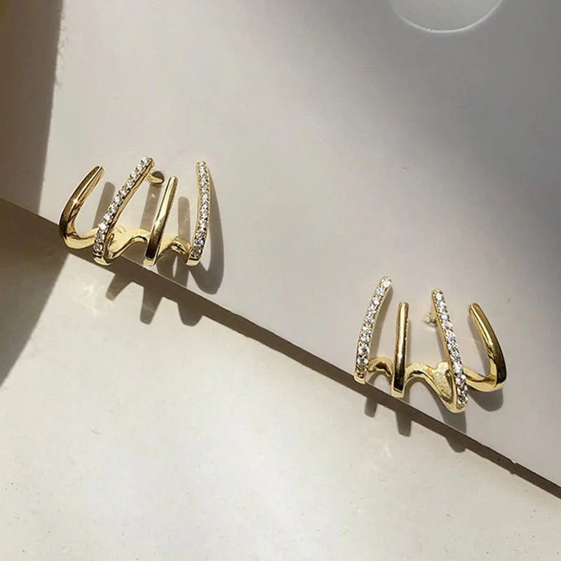 Dainty Shimmering Claw Huggie Earrings - Image 9