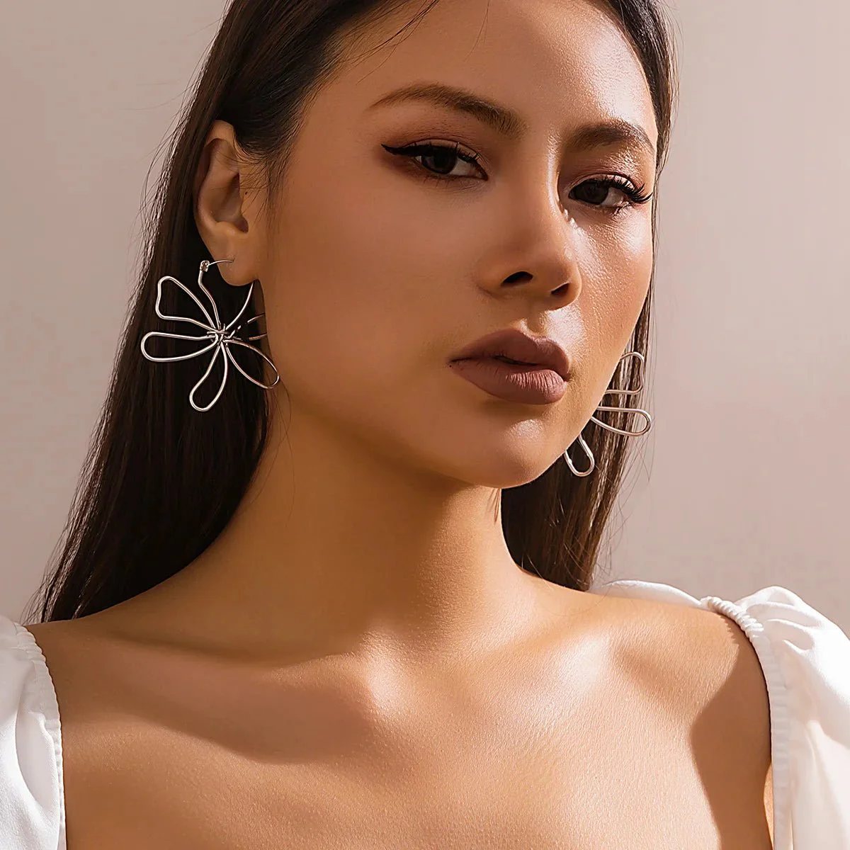 Floral Knot Outline Earrings - Image 8