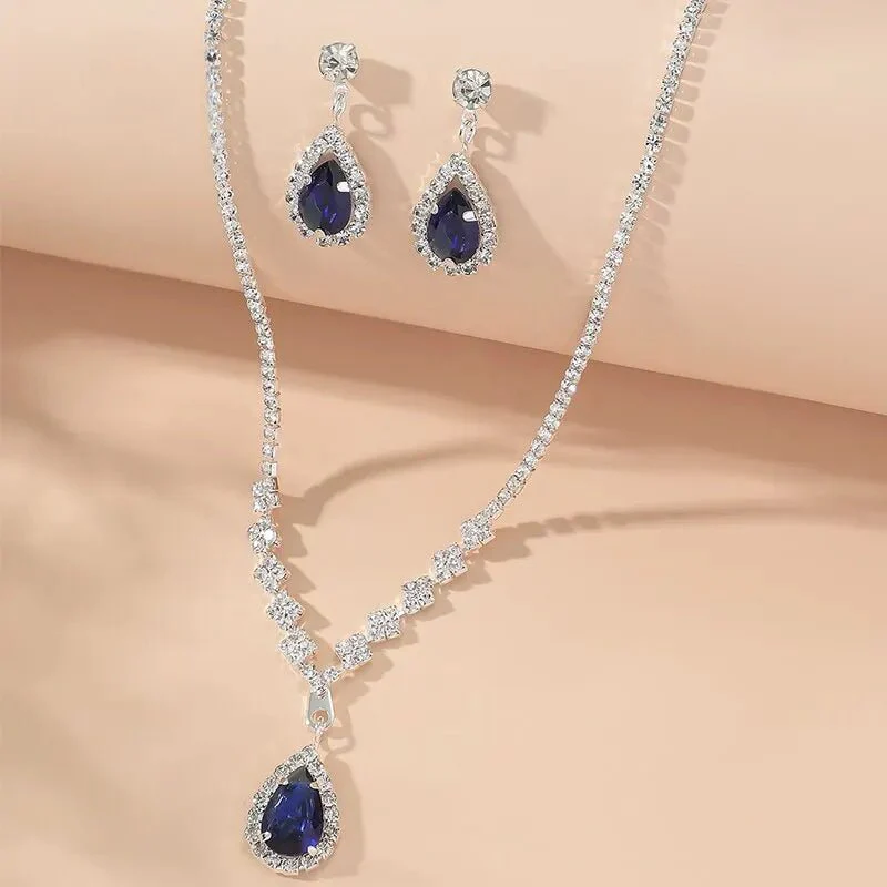 Shimmering Blue Teardrop Diamond Necklace and Earrings Set - Image 3